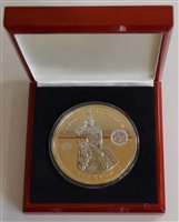 Lot 18 - Collection of coins in five cases to include Westminster U.S. Presidents, USA Liberty $20, 2012 Jubilee Monarch Ten Crown, 1953 London Mint Coronation Majesty Year set and London Mint Orders and De...