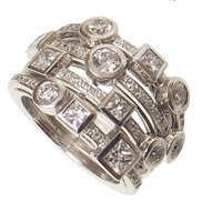 Lot 79 - Diamond 4-row platinum rain dance ring