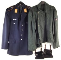 Lot 244 - German green tunic with Third Reich eagle (possibly added later) the inside marked 0/0321/0097II also a post war Luftwaffe jacket together with a pair of leather gaiters