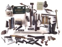 Lot 282 - Collection shooting related items including clips, magazines, reloading tools, parts of guns, etc.