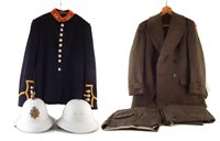 Lot 237 - Royal Marines Bandsman's tunic, two pith helmets Army overcoat and two pairs of trousers.