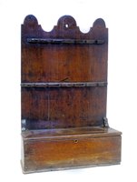 Lot 383 - Early 19th century oak spoon rack.