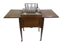 Lot 348 - Edwardian mahogany "surprise" cocktail cabinet.