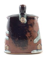 Lot 88 - James Hake, a small stoneware bottle covered in nuka ash and tenmoku glaze.