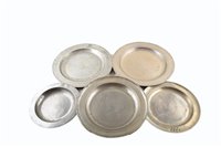 Lot 13 - Five pewter chargers of varying sizes and touchmarks. These include Harris, London touchmark amongst others.
