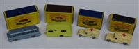 Lot 90 - Matchbox Series 14 ambulance, Series 14 Daimler ambulance, Series 40 long distance coach, Series 23 Berkley Cavalier caravan.