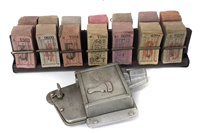 Lot 2 - Bell Punch bus ticket stamp no. 27142, together with a ticket rack and unused tickets.