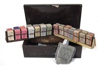 Lot 29 - Bell Punch bus ticket stamp no. 71700, together with two ticket racks and tickets, contained in metal tin