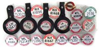Lot 9 - Nineteen bus / public transport  service drivers'  license badges and an enamel badge.