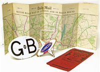 Lot 57 - Marcos enamel car badge, GB AA aluminium badge and a Daily Mail Road map.