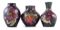 Lot 75 - Three small Moorcroft vases