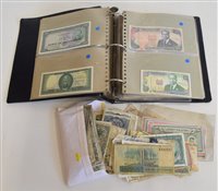 Lot 20 - World banknote collection contained within one album with a selection of loose notes.