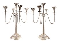 Lot 108 - A pair of silver plated candelabras