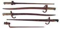 Lot 190 - Four French bayonets and a socket bayonet