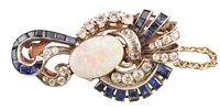 Lot 41 - Continental art-deco opal set clip