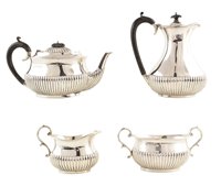 Lot 100 - Four piece silver tea set