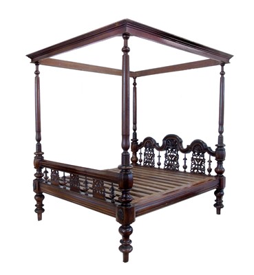 Lot 523A - Indian hardwood four poster bed.