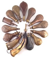 Lot 114 - Fourteen powder and shot flasks.