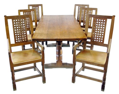 Lot 324 - Mouseman table and six Mouseman chairs