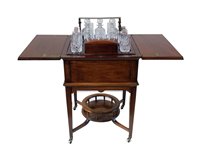 Lot 342 - Edwardian mahogany surprise drinks table.