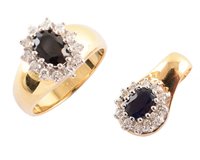 Lot 108 - Sapphire cluster pendant and ring