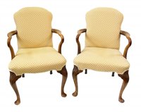 Lot 337 - A pair of 1920's beech open armchairs of Queen Anne style.