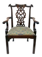Lot 336 - Late 19th century mahogany open armchair of George II style.