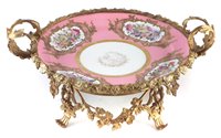 Lot 51 - Serves porcelain tazer dated 1843 in ormolu mount