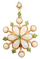 Lot 158 - Opal and demantoid garnet yellow gold cluster pendant brooch