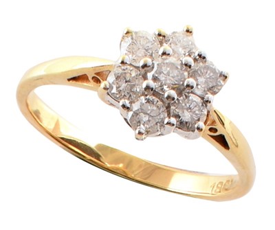 Lot 83 - Diamond flower head cluster 18ct gold ring
