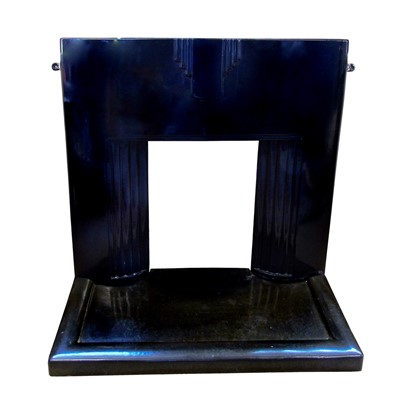 Lot 473 - First quarter 20th century Art Deco design black stove enamelled fire surround and hearth.