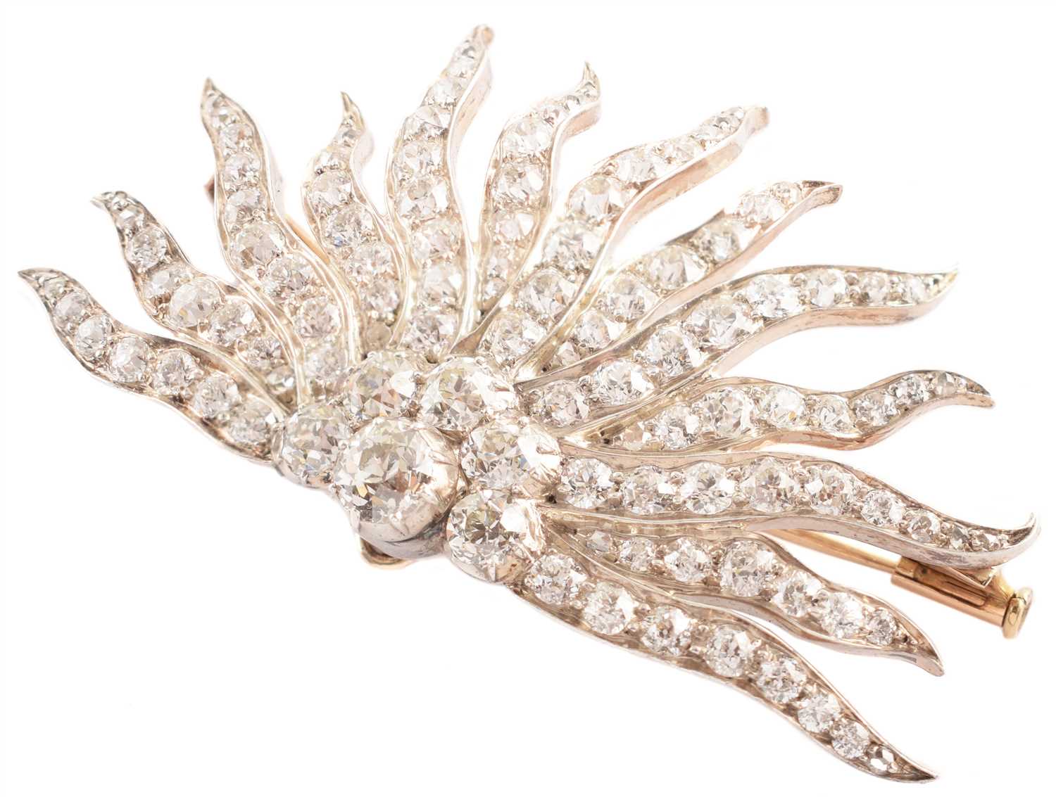 Lot 87 - 7ct diamond Edwardian sun-ray brooch
