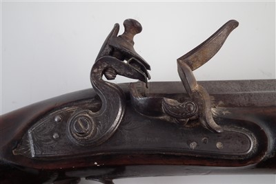 Lot 1 - Pair of flintlock overcoat pistols by Sykes Oxford