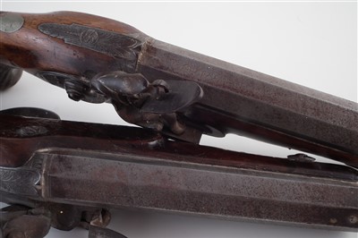 Lot 1 - Pair of flintlock overcoat pistols by Sykes Oxford