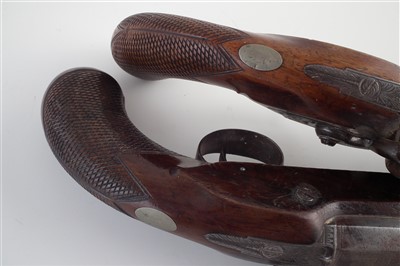 Lot 1 - Pair of flintlock overcoat pistols by Sykes Oxford
