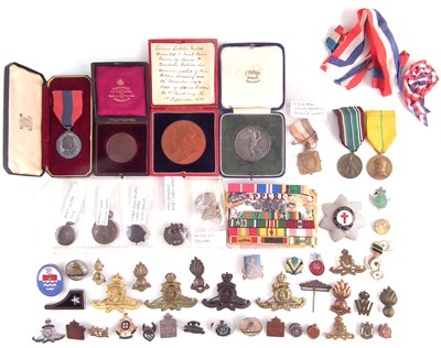 Lot 306 - Collection of medals and cap badges