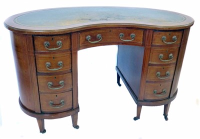 Lot 597 - Edwardian mahogany kidney shaped ladies writing desk.