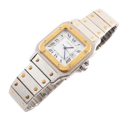 Lot 137 - A Cartier Santos steel and gold wristwatch.