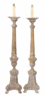 Lot 637 - A pair of early 19th century lime-wood and gesso torcheres.