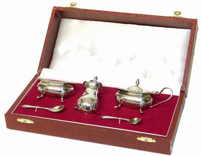 Lot 23 - A cased silver cruet set