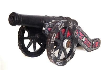 Lot 295 - Cast iron garden cannon