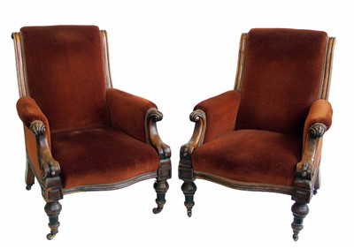Lot 507 - A pair of Victorian sprung upholstered armchairs.