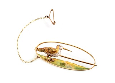 Lot 82 - An Edwardian 15ct gold and enamelled brooch.