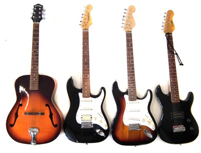 Lot 57 - Three electric guitars and a steel strung acoustic