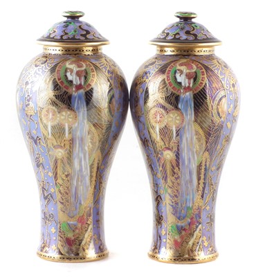 Lot 251 - Pair of Wedgwood Fairyland lustre lidded vases (damage to rims).