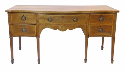 Lot 625 - George III mahogany serpentine front sideboard.