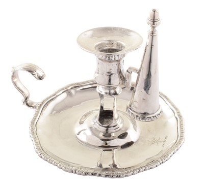 Lot 40 - Georgian silver chamber stick and snuffer.