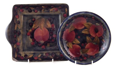 Lot 239 - Moorcroft dish and two handled bread and butter plate, pomegranate pattern.