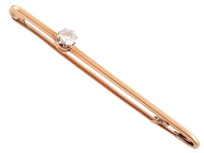 Lot 85 - Diamond single stone set yellow gold bar brooch/pin.