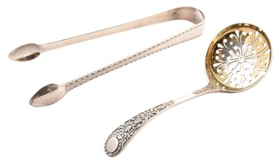 Lot 21 - Pair of Georgian silver sugar tongs, and an Atkin Bro's silver strainer.